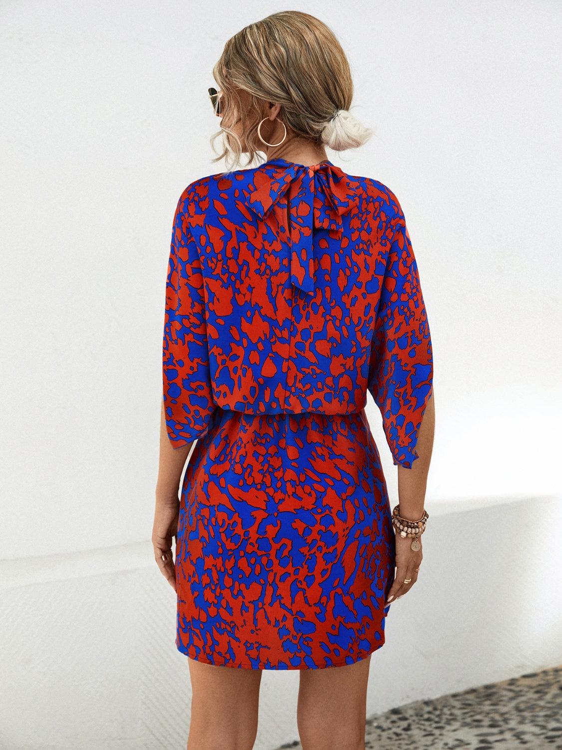 Tied Printed Mock Neck Mini Dress Carauana Store