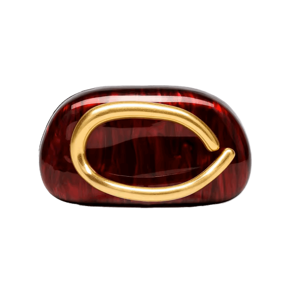 Red ring with gold design on a white background