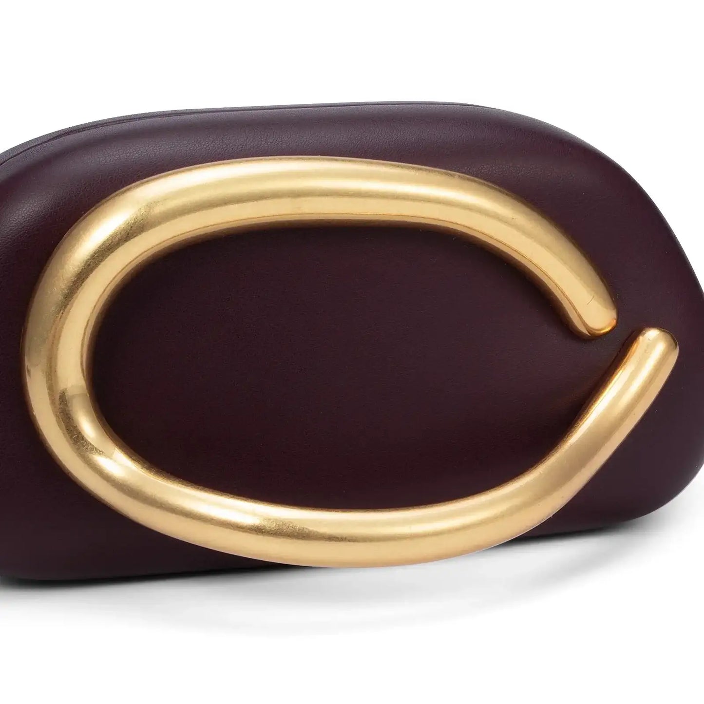 Purple clutch with a gold handle on a white background