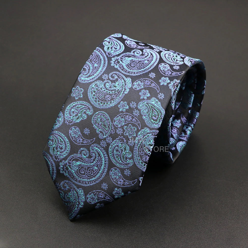 Paisley patterned tie on a dark background