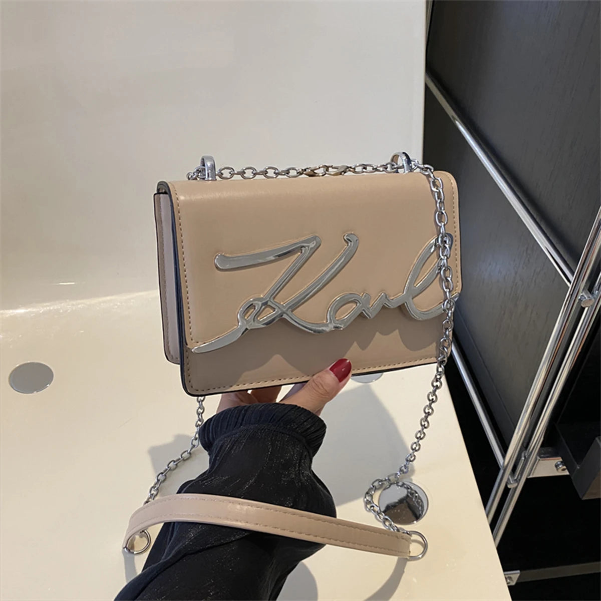 CaRaUaNa Karl Clutch Bag | showcases meticulous Italian leather