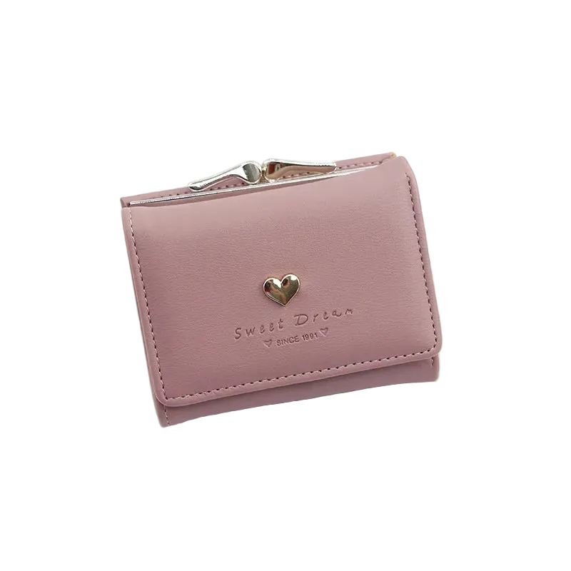 Pink wallet with a heart-shaped logo on a white surface